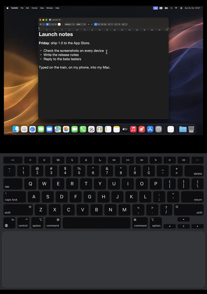 Uplid on the iPhone Duo inner screen: a TextEdit document called Launch notes on the Mac above the fold, the keyboard below it